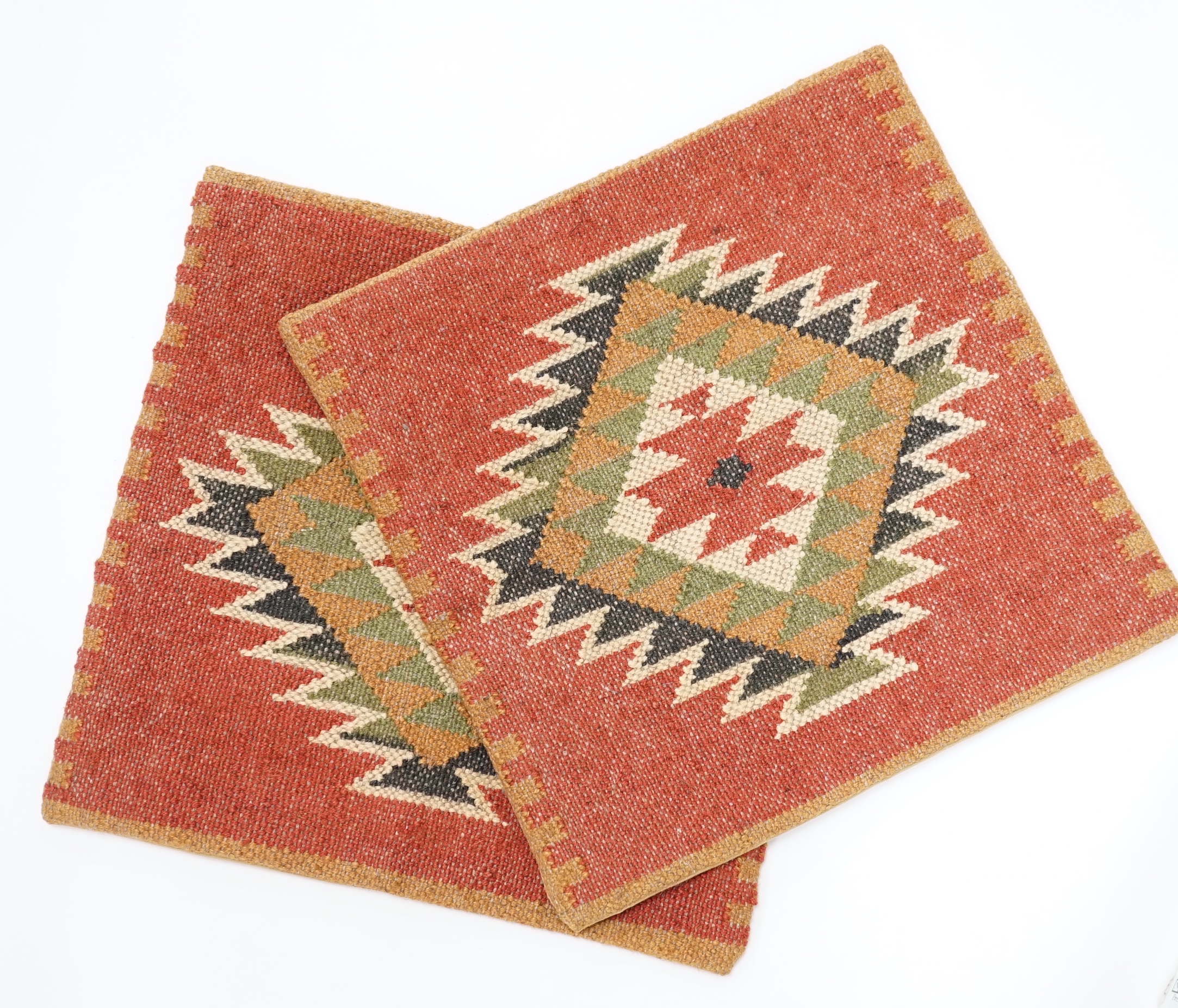 A pair of woven Kelim cushion covers with geometric design, 46cm x 46cm